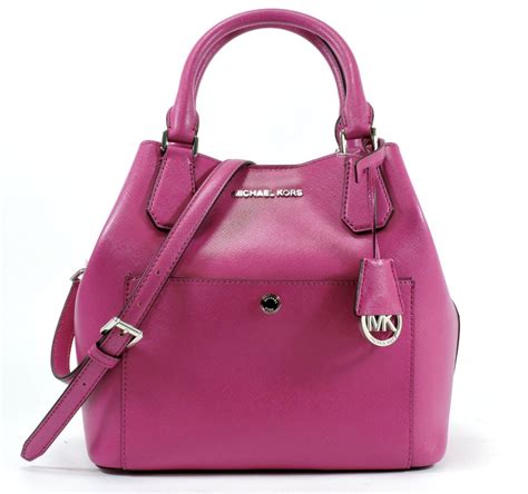 large fuschia michael kors bag|More.